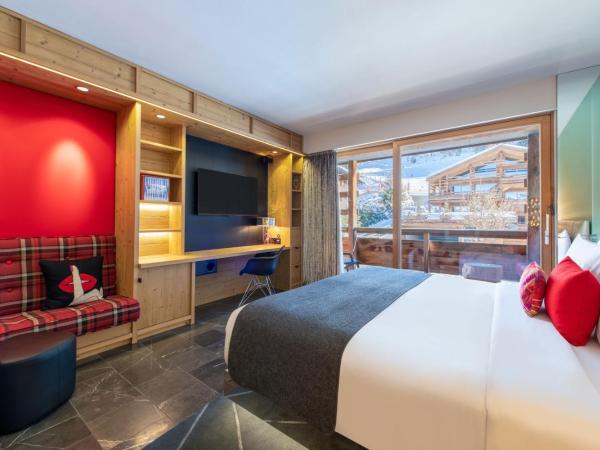 W Verbier : photo 4 de la chambre chambre fabulous avec 1 lit king-size et cheminée - vue sur montagne