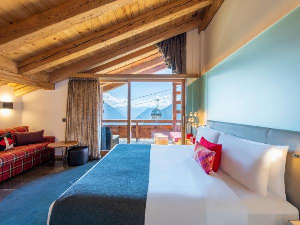 W Verbier : photo 3 de la chambre suite cool junior avec balcon et vue sur montagne