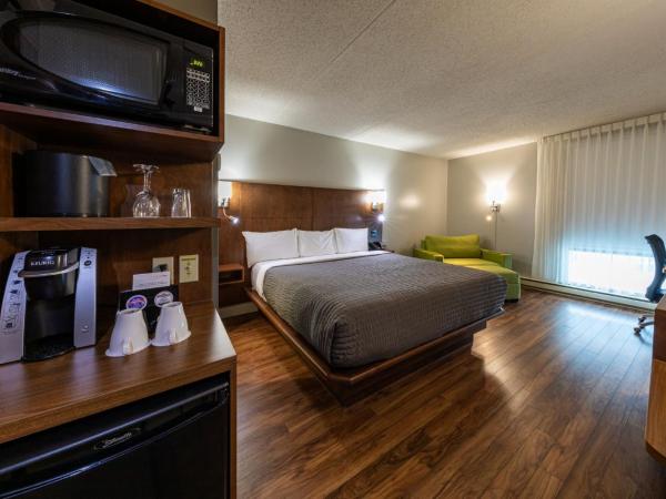Hôtel & Suites Normandin Québec : photo 6 de la chambre chambre lit king-size deluxe