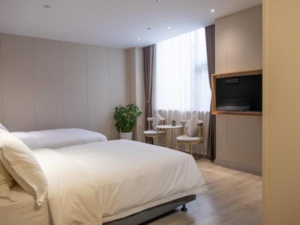 Shanghai JOYFUL YARD Hotel-Free shuttle bus from Pudong Airport and Disneylan : photo 6 de la chambre chambre familiale