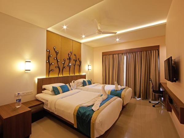 Golden Fruits Business Suites : photo 1 de la chambre chambre double standard