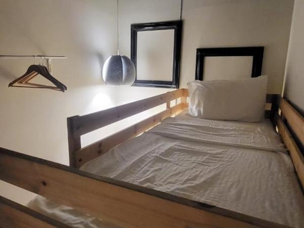 Kim Haus Loft : photo 3 de la chambre hébergement lits jumeaux privé avec salle de bains commune