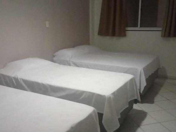 Pousada Ponta Negra : photo 6 de la chambre chambre quadruple deluxe