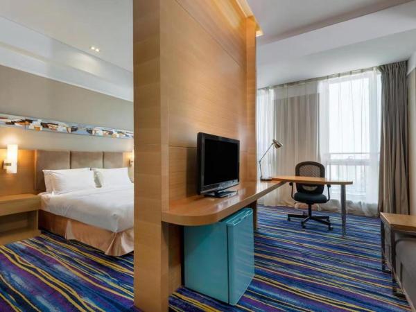 Holiday Inn Express Tianjin Heping, an IHG Hotel : photo 1 de la chambre suite lit king-size