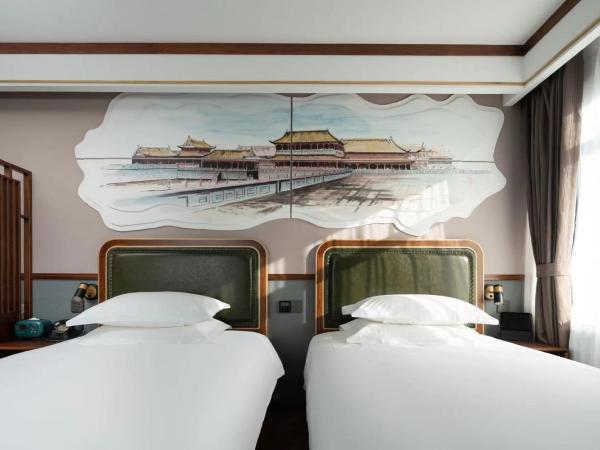 Time Traveller Boutique Hotel - Near Beijing Xidan Financial Street, Central Conservatory of Music, Tian'anmen Square, The Capital Museum, 10 minutes away from Beijing West Railway Station, Free ice cream, coffee and laundry service, Free GYM : photo 1 de la chambre chambre lits jumeaux deluxe