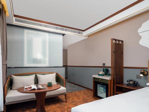 Time Traveller Boutique Hotel - Near Beijing Xidan Financial Street, Central Conservatory of Music, Tian'anmen Square, The Capital Museum, 10 minutes away from Beijing West Railway Station, Free ice cream, coffee and laundry service, Free GYM : photo 2 de la chambre chambre lits jumeaux deluxe