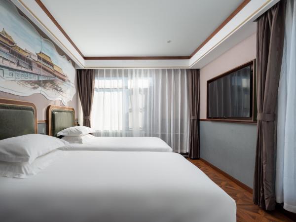 Time Traveller Boutique Hotel - Near Beijing Xidan Financial Street, Central Conservatory of Music, Tian'anmen Square, The Capital Museum, 10 minutes away from Beijing West Railway Station, Free ice cream, coffee and laundry service, Free GYM : photo 4 de la chambre chambre lits jumeaux deluxe