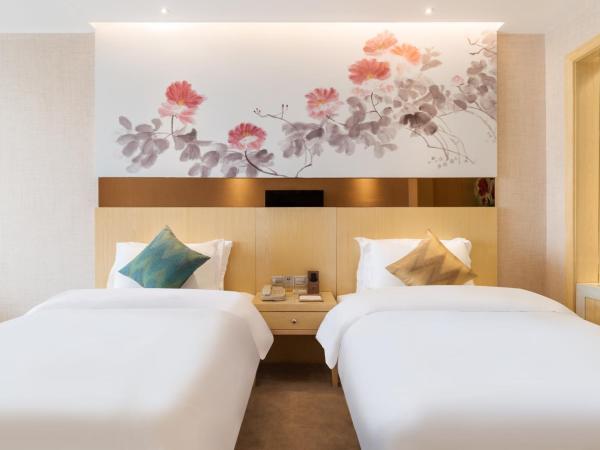 Paco Hotel Suyuan Metro Guangzhou-Free Shuttle Bus for Canton Fair : photo 4 de la chambre chambre lits jumeaux supérieure