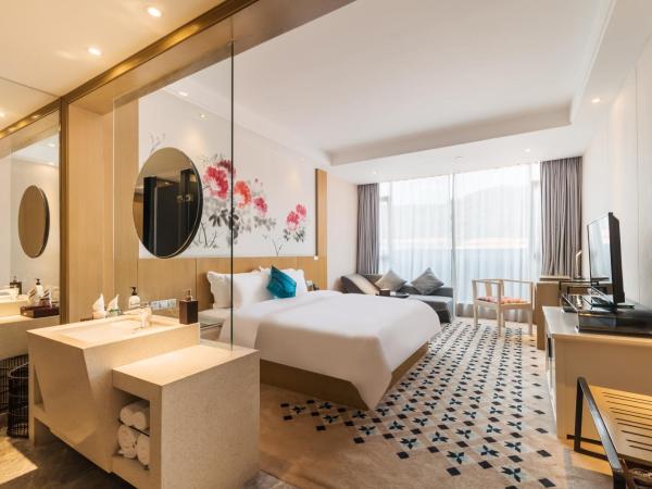 Paco Hotel Suyuan Metro Guangzhou-Free Shuttle Bus for Canton Fair : photo 1 de la chambre chambre lit king-size