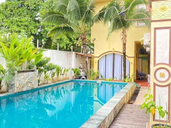 Casugria Dutch Residence 1810 : photo 4 de la chambre chambre lit queen-size - vue sur piscine