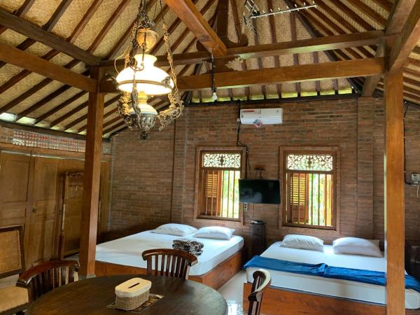 Omah Mbah Mandor by The Lavana : photo 1 de la chambre villa