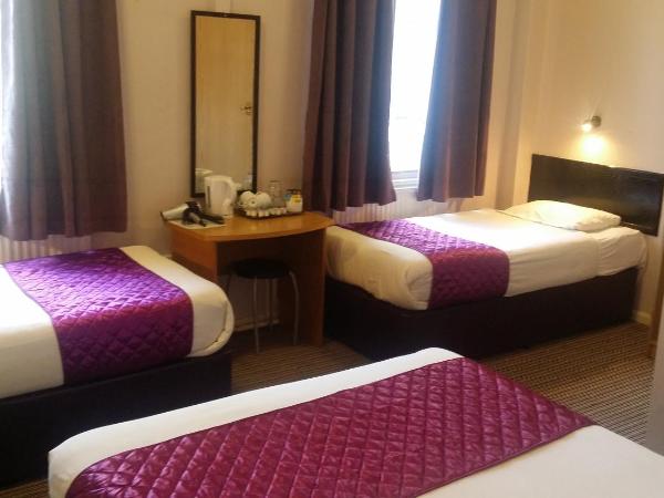 Arriva Hotel : photo 1 de la chambre chambre quadruple