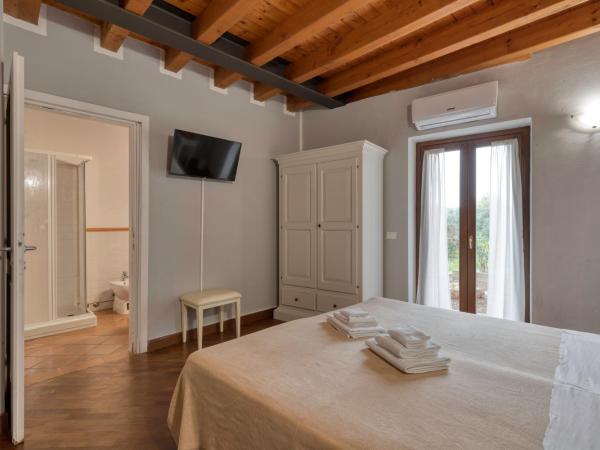 Cascina Volta : photo 4 de la chambre chambre triple