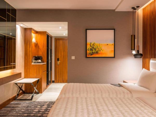 Le Méridien Dubai Hotel & Conference Centre : photo 1 de la chambre  chambre lits jumeaux deluxe avec 2 lits simples - vue sur jardin - navette gratuite vers dubai mall/burj khalifa et aéroport international de dubaï (dxb)