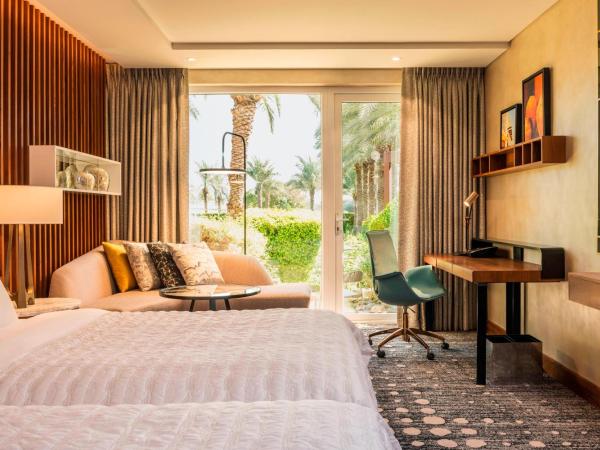 Le Méridien Dubai Hotel & Conference Centre : photo 2 de la chambre  chambre lits jumeaux deluxe avec 2 lits simples - vue sur jardin - navette gratuite vers dubai mall/burj khalifa et aéroport international de dubaï (dxb)