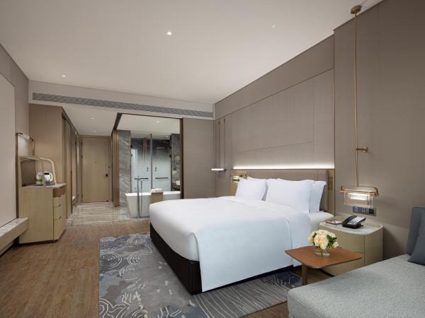 Wonderland Hotel Ningbo International Conference Center : photo 3 de la chambre deluxe king room with garden view