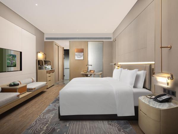 Wonderland Hotel Ningbo International Conference Center : photo 2 de la chambre chambre lit king-size deluxe - vue sur lac
