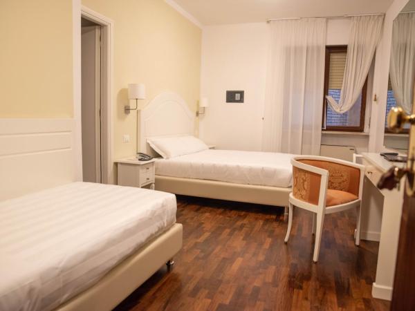 Grand Hotel Duomo : photo 1 de la chambre chambre triple