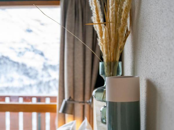 ho36 Les Menuires : photo 7 de la chambre chambre familiale