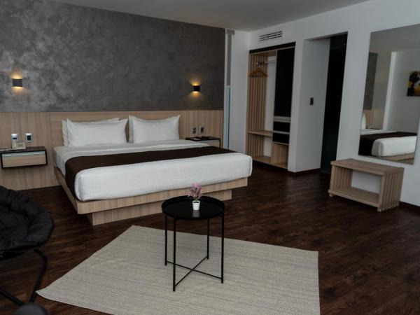 Fato Hotel : photo 1 de la chambre chambre lit king-size supérieure