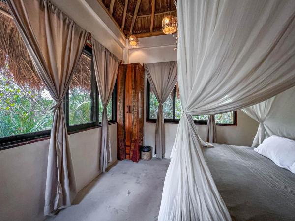 Diamante K - Inside Tulum National Park : photo 7 de la chambre bungalow lit king-size - vue sur jardin