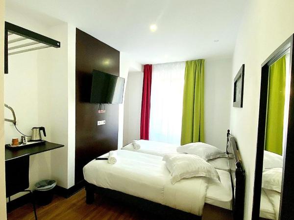 Enzo Hotels Limoges Centre Jourdan by Kyriad Direct : photo 3 de la chambre chambre standard - 2 lits simples