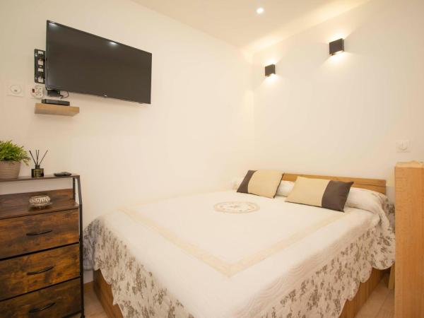 CHESSY Chambre indépendante DISNEY GIARDINO DELLA FELICITA : photo 10 de la chambre chambre triple - vue sur jardin