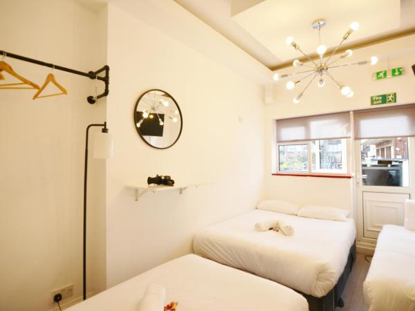 Anchor Guest House : photo 2 de la chambre chambre quadruple