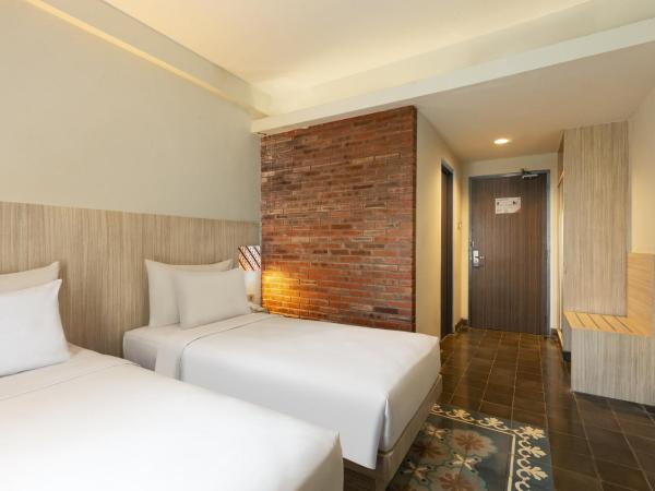 Burza Hotel Yogyakarta : photo 3 de la chambre chambre lits jumeaux deluxe