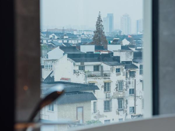AC Hotel by Marriott Suzhou China : photo 3 de la chambre suite lit king-size - vue sur ville