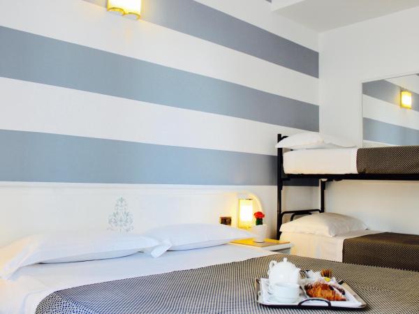 Hotel Du Soleil : photo 3 de la chambre chambre quadruple standard