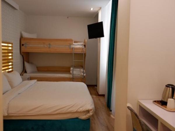 Athenian Montaza Hotel : photo 2 de la chambre chambre quadruple