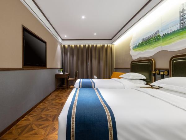 Time Traveller Boutique Hotel - Near National Olympic Sports Center , Beijing National Stadium , Olympic Forest Park , China Ethnic Museum, Guanzhuang subway station, Free laundry, Free customized tour itinerary : photo 2 de la chambre deluxe executive double room(for mainland chinese guests only)