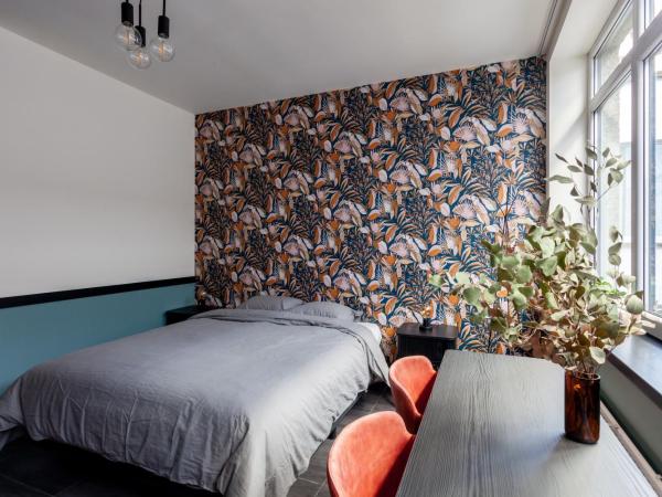 Hey - Aparthotel Brussels : photo 2 de la chambre studio lit king-size avec canapé-lit