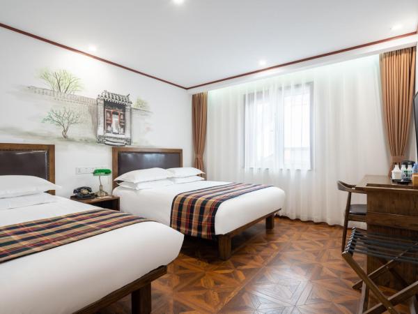 Time Traveller Hotel -15 minutes walk to Tian 'anmen Square,Near Forbidden City ,Chairman Mao Memorial Hall ,Temple of Heaven,Wangfujing Walkway, many museums nearby,feel old Beijing culture : photo 2 de la chambre chambre familiale standard