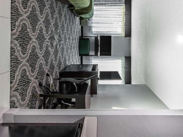 Quality Suites Pineville - Charlotte : photo 6 de la chambre deluxe queen suite with two queen beds and sofa bed - non-smoking