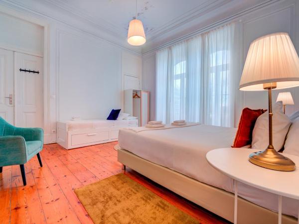 Chalet D´Ávila Guest House : photo 5 de la chambre chambre quadruple avec salle de bains commune