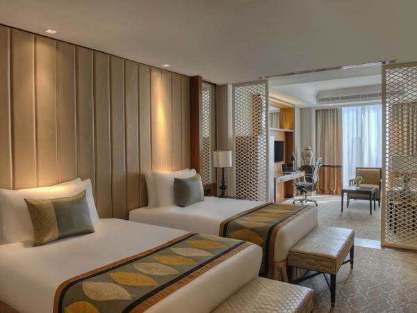 Taj Dubai : photo 1 de la chambre chambre familiale lits jumeaux - vue sur ville