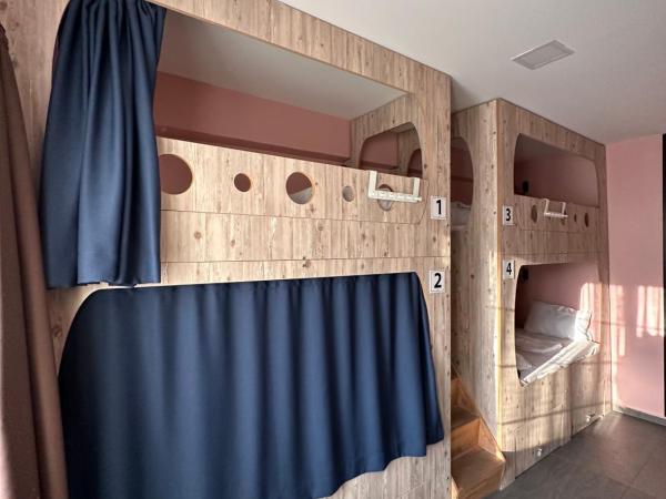 Archeo : photo 3 de la chambre lit dans dortoir pour femmes de 4 lits