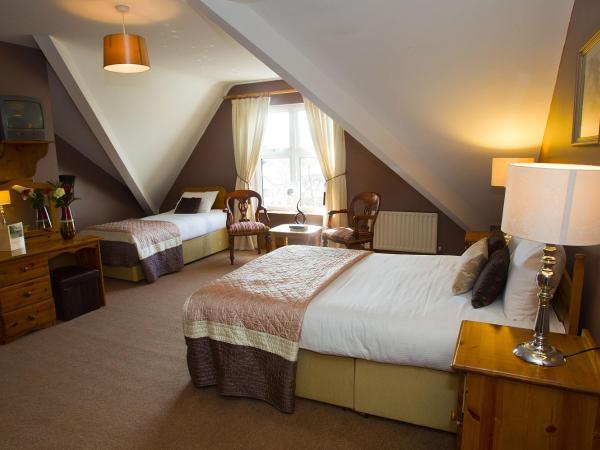 Woodlawn House : photo 1 de la chambre chambre triple