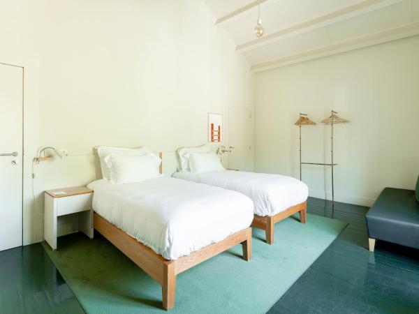 Duas Portas Townhouse : photo 1 de la chambre chambre triple - vue sur jardin