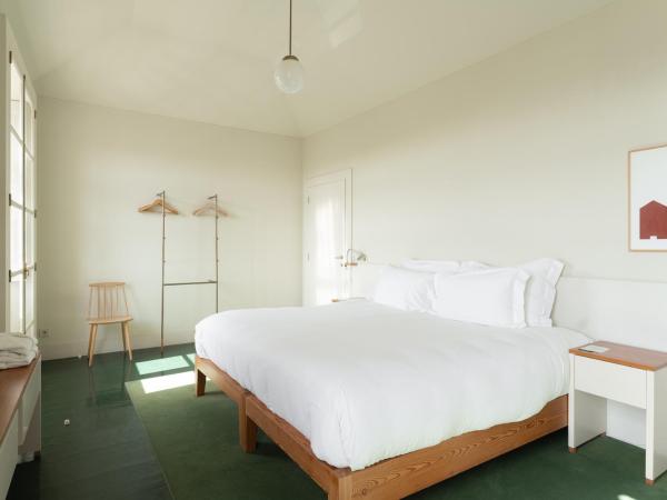 Duas Portas Townhouse : photo 3 de la chambre chambre double deluxe - vue sur mer