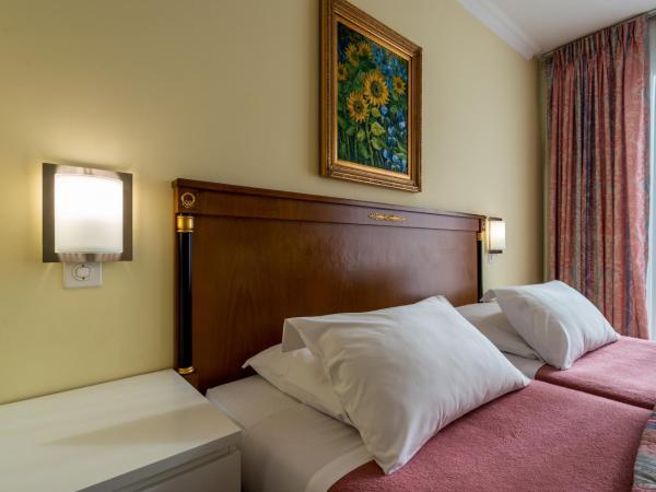 Hotel Churchill : photo 1 de la chambre chambre lits jumeaux