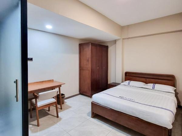 Global Residency : photo 6 de la chambre chambre double avec salle de bains privative