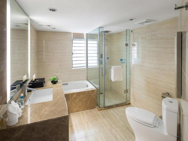 The LA Hotel 新世界伟瑞酒店 : photo 3 de la chambre chambre lit queen-size 