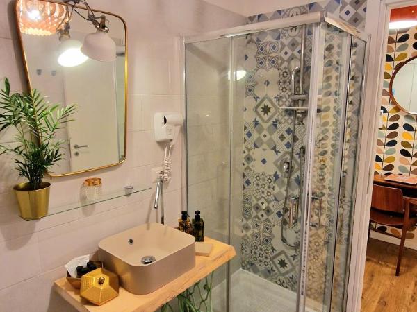 Napoli Tree - Lungomare : photo 7 de la chambre chambre quadruple confort