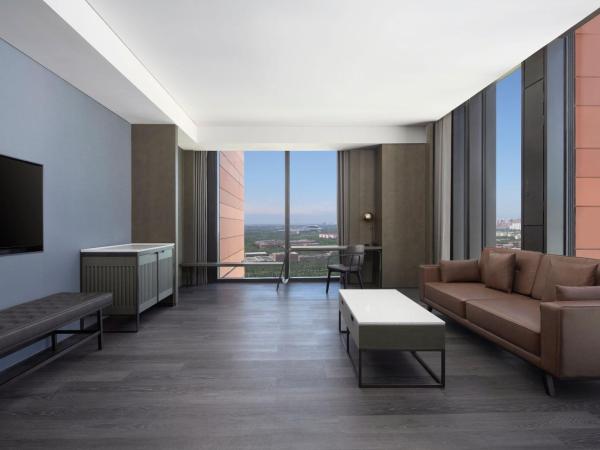 Four Points by Sheraton Tianjin National Convention and Exhibition Center : photo 3 de la chambre suite junior lit king-size