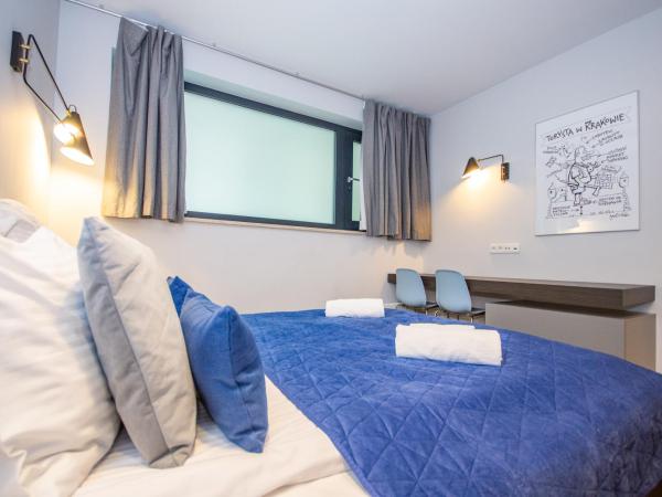 InPoint Apartments G13 near Old Town & Kazimierz : photo 9 de la chambre appartement 2 chambres avec balcon et climatisation 