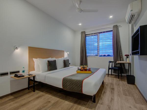 Townhouse 040 Global Village Tech Park Near Kengeri Bus Terminal Metro Station : photo 5 de la chambre chambre triple classique