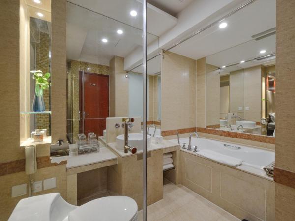 Bayshore Hotel Dalian : photo 6 de la chambre chambre double deluxe - vue sur jardin